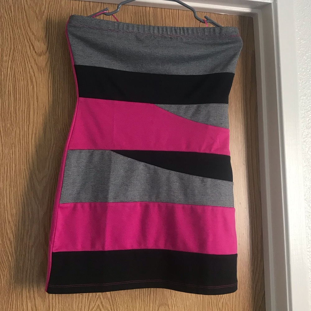 Pink dress with black and grey stripes.